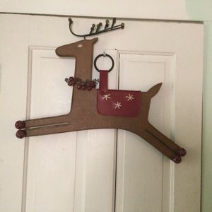 Christmas reindeer leather bells measures 20”X24”X1” door hanger May be vintage